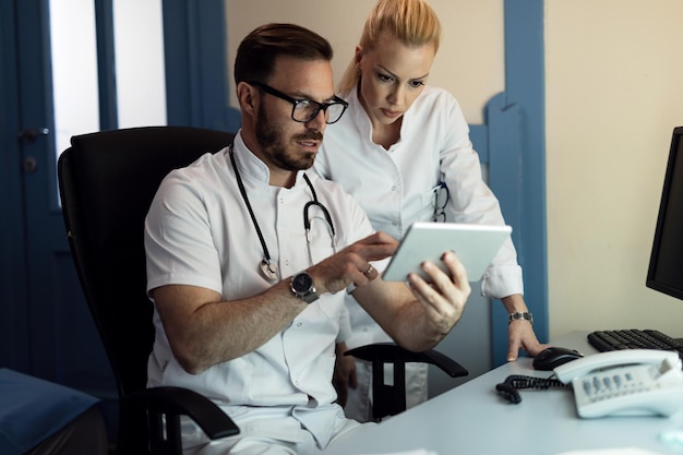 Healthcare team reviewing electronic medical records